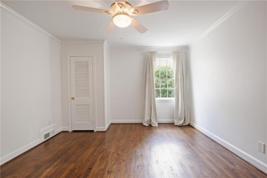 Don't miss this delightful white brick home in the heart of one on Bobby Jones Golf Club in Georgia - for sale on GolfHomes.com, golf home, golf lot