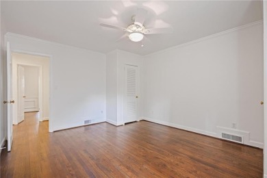 Don't miss this delightful white brick home in the heart of one on Bobby Jones Golf Club in Georgia - for sale on GolfHomes.com, golf home, golf lot