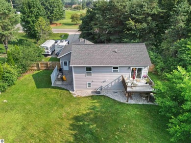Welcome to this spacious 3-bedroom, 2-bath walkout home on on Bay Meadows Golf Course - Executive in Michigan - for sale on GolfHomes.com, golf home, golf lot