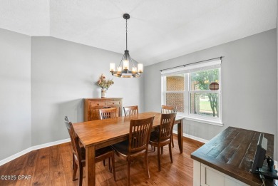 This spacious and beautifully updated 4-bedroom, 2.5-bath brick on Panama Country Club in Florida - for sale on GolfHomes.com, golf home, golf lot
