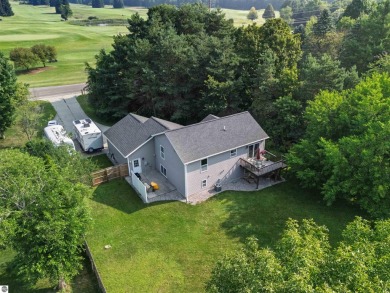 Welcome to this spacious 3-bedroom, 2-bath walkout home on on Bay Meadows Golf Course - Executive in Michigan - for sale on GolfHomes.com, golf home, golf lot