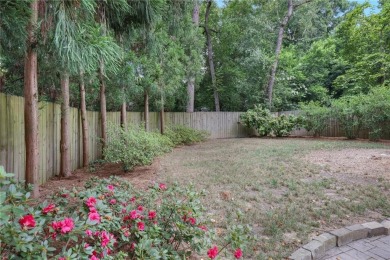 Don't miss this delightful white brick home in the heart of one on Bobby Jones Golf Club in Georgia - for sale on GolfHomes.com, golf home, golf lot