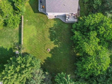 Welcome to this spacious 3-bedroom, 2-bath walkout home on on Bay Meadows Golf Course - Executive in Michigan - for sale on GolfHomes.com, golf home, golf lot