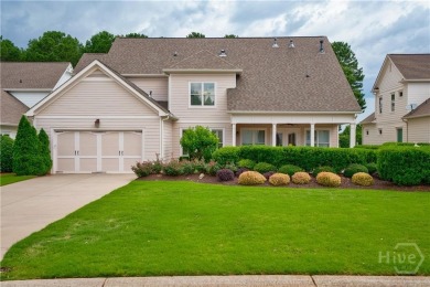 Nestled on a professionally landscaped lot overlooking Bent Pine on The Georgia Club in Georgia - for sale on GolfHomes.com, golf home, golf lot