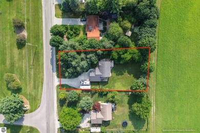 Welcome to this spacious 3-bedroom, 2-bath walkout home on on Bay Meadows Golf Course - Executive in Michigan - for sale on GolfHomes.com, golf home, golf lot