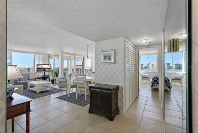 You'll be captivated the moment you step through the door of on Isla Del Sol Yacht and Country Club in Florida - for sale on GolfHomes.com, golf home, golf lot