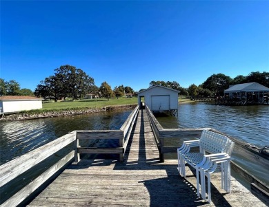 This waterfront property boasts a panoramic view of Lake Fork on Lake Fork Golf Club - Rains County in Texas - for sale on GolfHomes.com, golf home, golf lot
