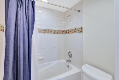 From this third floor covered balcony, enjoy beautiful views of on Sandestin Golf and Beach Resort - Raven in Florida - for sale on GolfHomes.com, golf home, golf lot