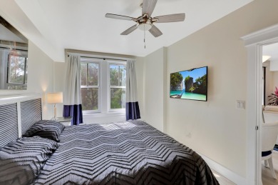 From this third floor covered balcony, enjoy beautiful views of on Sandestin Golf and Beach Resort - Raven in Florida - for sale on GolfHomes.com, golf home, golf lot