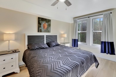 From this third floor covered balcony, enjoy beautiful views of on Sandestin Golf and Beach Resort - Raven in Florida - for sale on GolfHomes.com, golf home, golf lot