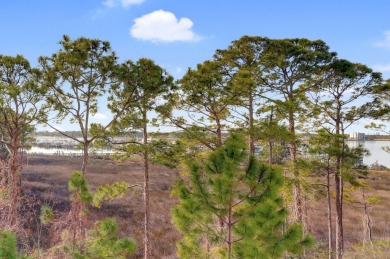 From this third floor covered balcony, enjoy beautiful views of on Sandestin Golf and Beach Resort - Raven in Florida - for sale on GolfHomes.com, golf home, golf lot