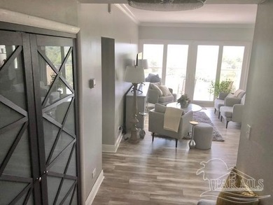 Welcome Home! This totally upgraded & renovated 2/2 west-end on Pensacola Country Club in Florida - for sale on GolfHomes.com, golf home, golf lot