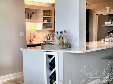 Welcome Home! This totally upgraded & renovated 2/2 west-end on Pensacola Country Club in Florida - for sale on GolfHomes.com, golf home, golf lot