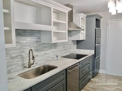 Welcome Home! This totally upgraded & renovated 2/2 west-end on Pensacola Country Club in Florida - for sale on GolfHomes.com, golf home, golf lot