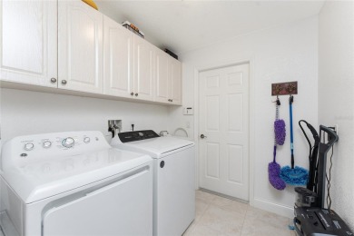 Beautiful and well maintained 3 bedroom, 2.5 bathroom, custom on Pinemoor West Golf Club in Florida - for sale on GolfHomes.com, golf home, golf lot