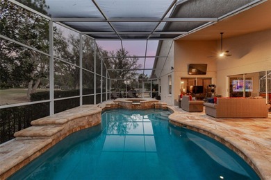 An extraordinary opportunity to own this beautifully appointed on Hunters Green Country Club in Florida - for sale on GolfHomes.com, golf home, golf lot