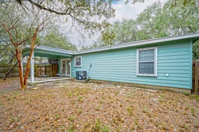 Nestled beneath large shade oak trees, this fully furnished on Rockport Country Club in Texas - for sale on GolfHomes.com, golf home, golf lot