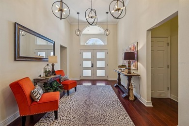 An extraordinary opportunity to own this beautifully appointed on Hunters Green Country Club in Florida - for sale on GolfHomes.com, golf home, golf lot