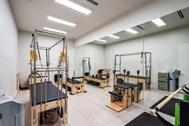 Experience resort-style living in this stunning single-story on Addison Reserve in Florida - for sale on GolfHomes.com, golf home, golf lot