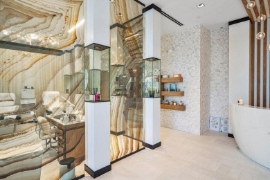 Experience resort-style living in this stunning single-story on Addison Reserve in Florida - for sale on GolfHomes.com, golf home, golf lot