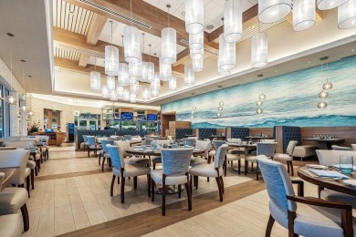 Experience resort-style living in this stunning single-story on Addison Reserve in Florida - for sale on GolfHomes.com, golf home, golf lot