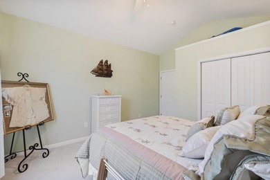 Enjoy stunning views of a serene pond from this beautifully on Palmetto Greens Golf and Country Club in South Carolina - for sale on GolfHomes.com, golf home, golf lot