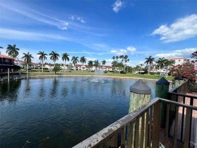 Paradise found! Take up residence at this unique enclave of on Isla Del Sol Yacht and Country Club in Florida - for sale on GolfHomes.com, golf home, golf lot