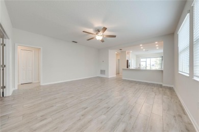 Located in the 55+ gated community of The Lakes at Harmony, this on Harmony Golf Preserve in Florida - for sale on GolfHomes.com, golf home, golf lot