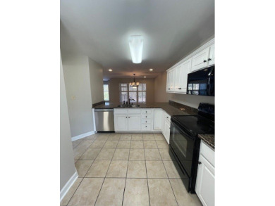 Situated along the waters edge in the prestigious neighborhood on Red Eagle Golf Course in Alabama - for sale on GolfHomes.com, golf home, golf lot
