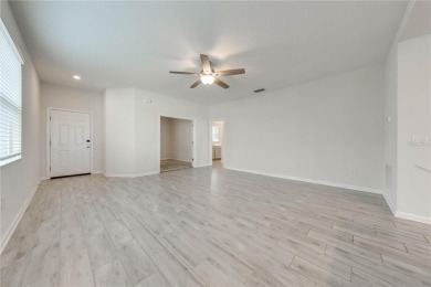 Located in the 55+ gated community of The Lakes at Harmony, this on Harmony Golf Preserve in Florida - for sale on GolfHomes.com, golf home, golf lot