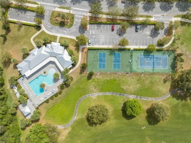 Located in the 55+ gated community of The Lakes at Harmony, this on Harmony Golf Preserve in Florida - for sale on GolfHomes.com, golf home, golf lot