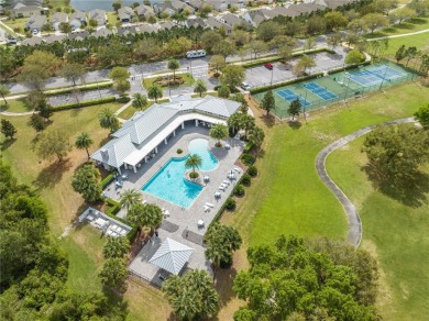 Located in the 55+ gated community of The Lakes at Harmony, this on Harmony Golf Preserve in Florida - for sale on GolfHomes.com, golf home, golf lot