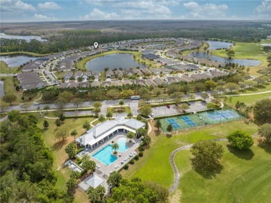 Located in the 55+ gated community of The Lakes at Harmony, this on Harmony Golf Preserve in Florida - for sale on GolfHomes.com, golf home, golf lot