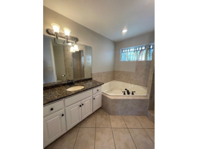 Situated along the waters edge in the prestigious neighborhood on Red Eagle Golf Course in Alabama - for sale on GolfHomes.com, golf home, golf lot