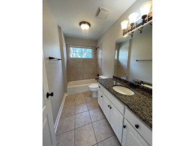 Situated along the waters edge in the prestigious neighborhood on Red Eagle Golf Course in Alabama - for sale on GolfHomes.com, golf home, golf lot