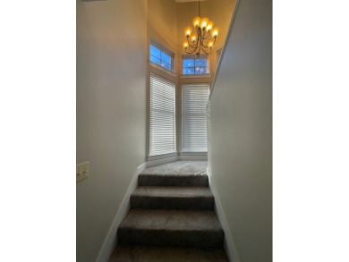 Situated along the waters edge in the prestigious neighborhood on Red Eagle Golf Course in Alabama - for sale on GolfHomes.com, golf home, golf lot