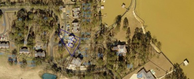 Situated along the waters edge in the prestigious neighborhood on Red Eagle Golf Course in Alabama - for sale on GolfHomes.com, golf home, golf lot