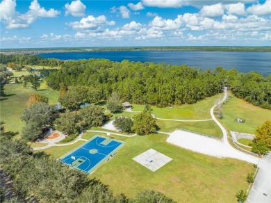 Located in the 55+ gated community of The Lakes at Harmony, this on Harmony Golf Preserve in Florida - for sale on GolfHomes.com, golf home, golf lot