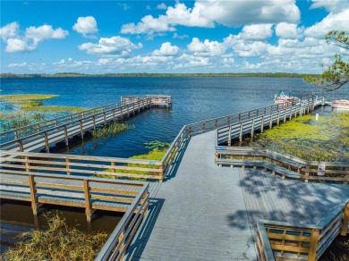 Located in the 55+ gated community of The Lakes at Harmony, this on Harmony Golf Preserve in Florida - for sale on GolfHomes.com, golf home, golf lot