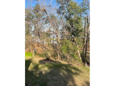 Situated along the waters edge in the prestigious neighborhood on Red Eagle Golf Course in Alabama - for sale on GolfHomes.com, golf home, golf lot