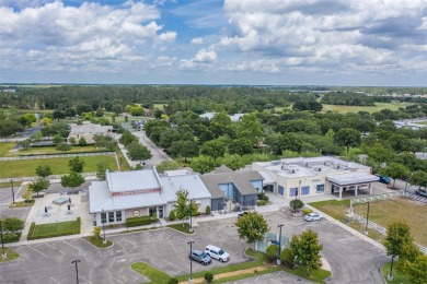Located in the 55+ gated community of The Lakes at Harmony, this on Harmony Golf Preserve in Florida - for sale on GolfHomes.com, golf home, golf lot