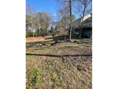 Situated along the waters edge in the prestigious neighborhood on Red Eagle Golf Course in Alabama - for sale on GolfHomes.com, golf home, golf lot