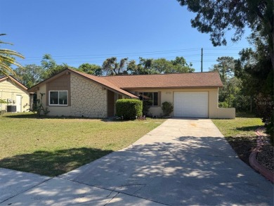 Under contract-accepting backup offers. This stunning move-in on Beacon Woods Golf Club in Florida - for sale on GolfHomes.com, golf home, golf lot