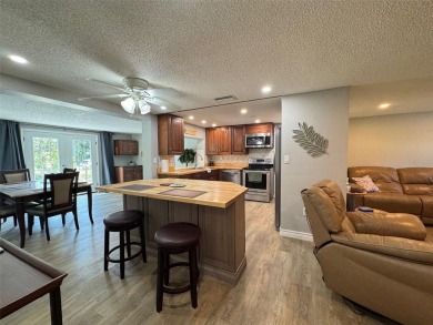 Under contract-accepting backup offers. This stunning move-in on Beacon Woods Golf Club in Florida - for sale on GolfHomes.com, golf home, golf lot