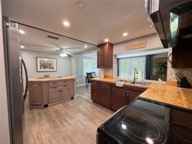 Under contract-accepting backup offers. This stunning move-in on Beacon Woods Golf Club in Florida - for sale on GolfHomes.com, golf home, golf lot