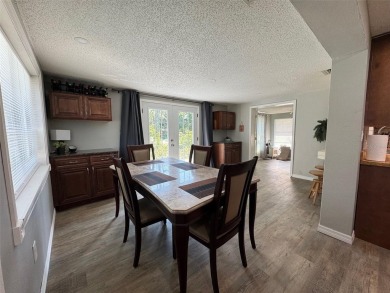 Under contract-accepting backup offers. This stunning move-in on Beacon Woods Golf Club in Florida - for sale on GolfHomes.com, golf home, golf lot