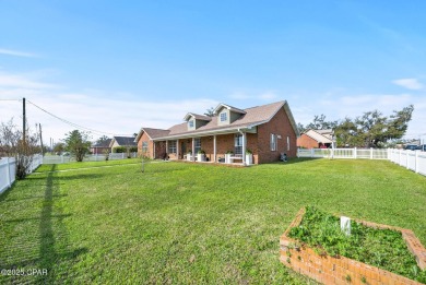 Always dreamed of a home with a white picket fence? This corner on Panama Country Club in Florida - for sale on GolfHomes.com, golf home, golf lot