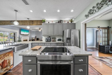 Always dreamed of a home with a white picket fence? This corner on Panama Country Club in Florida - for sale on GolfHomes.com, golf home, golf lot
