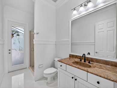 Tucked away on a rarely available, exceptionally private lot at on The Legacy Golf and Tennis Club in Florida - for sale on GolfHomes.com, golf home, golf lot