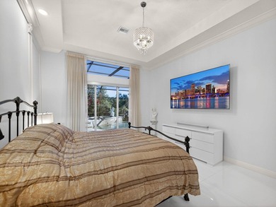 Tucked away on a rarely available, exceptionally private lot at on The Legacy Golf and Tennis Club in Florida - for sale on GolfHomes.com, golf home, golf lot